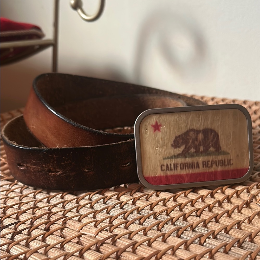 California Republic Brown Leather Belt. Wooden and metal buckle. 32” waist